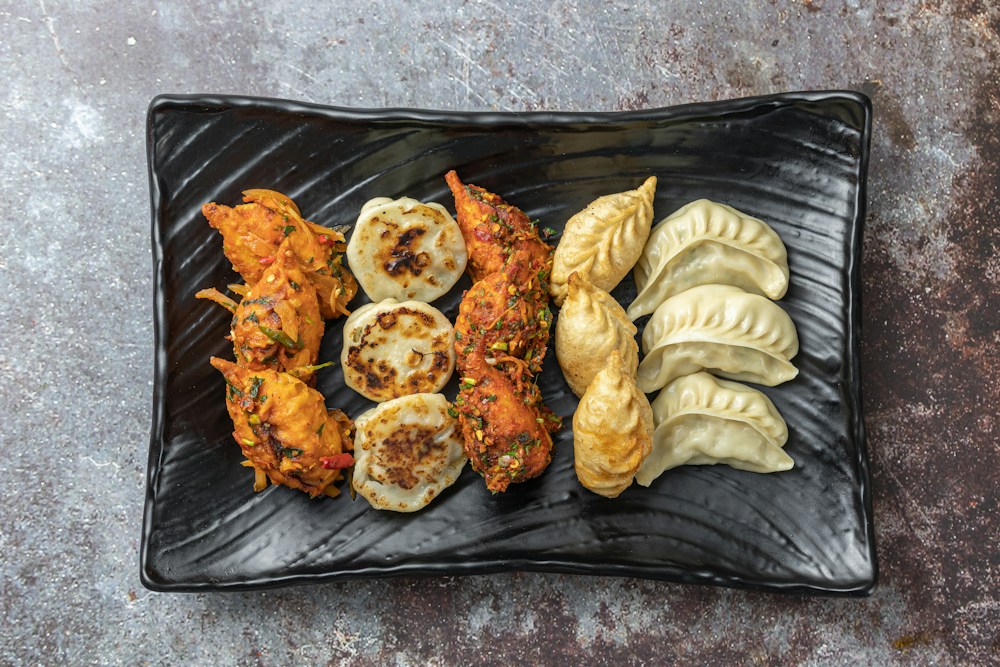 Fresh momos served with a spicy dipping sauce